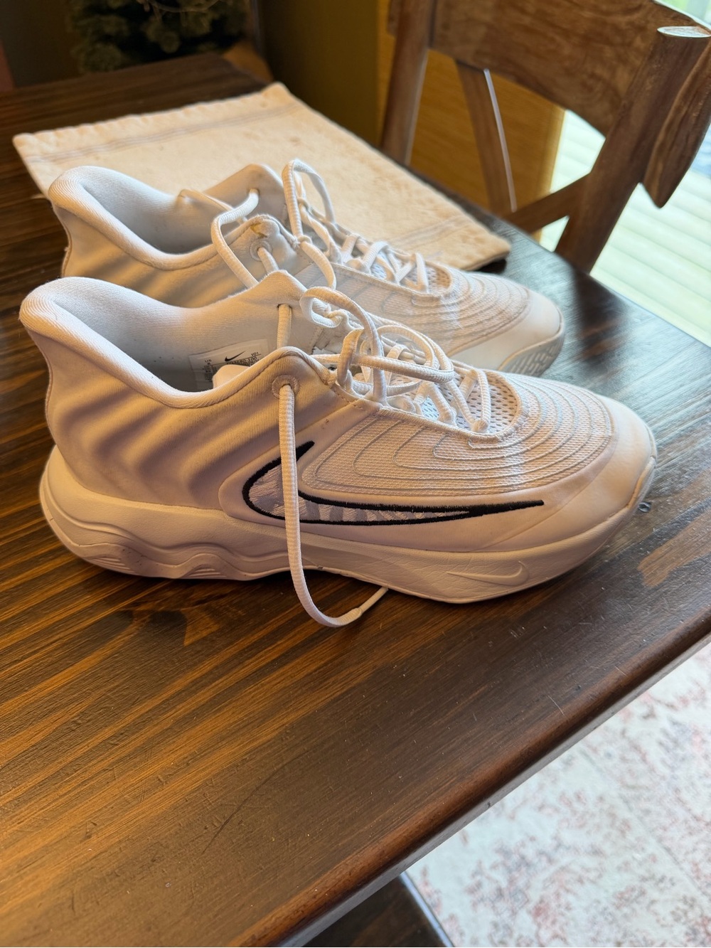 Nike Men's White Sneakers with Black Swoosh Accent
